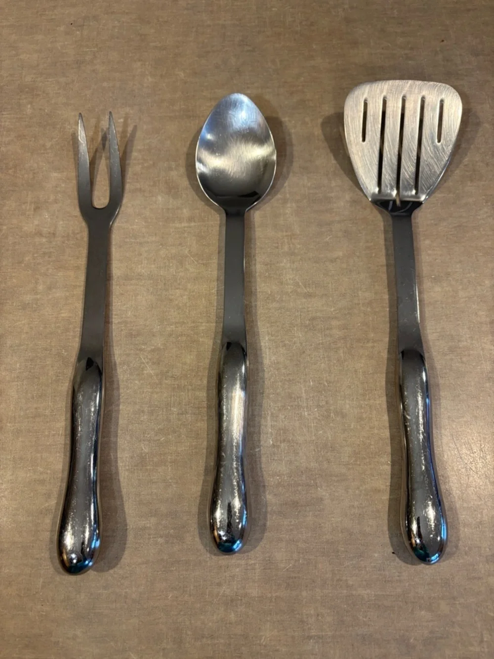 Three-Piece Stainless Serving Set with curved Handles